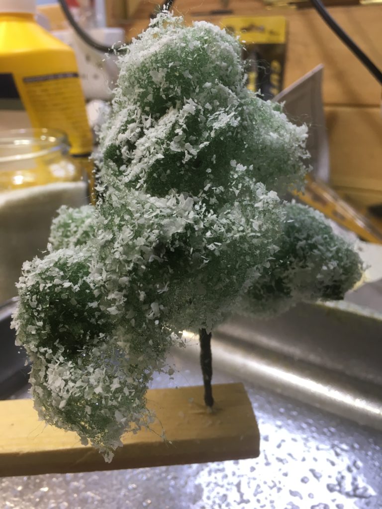 Wetted tree coated with Polycell powder